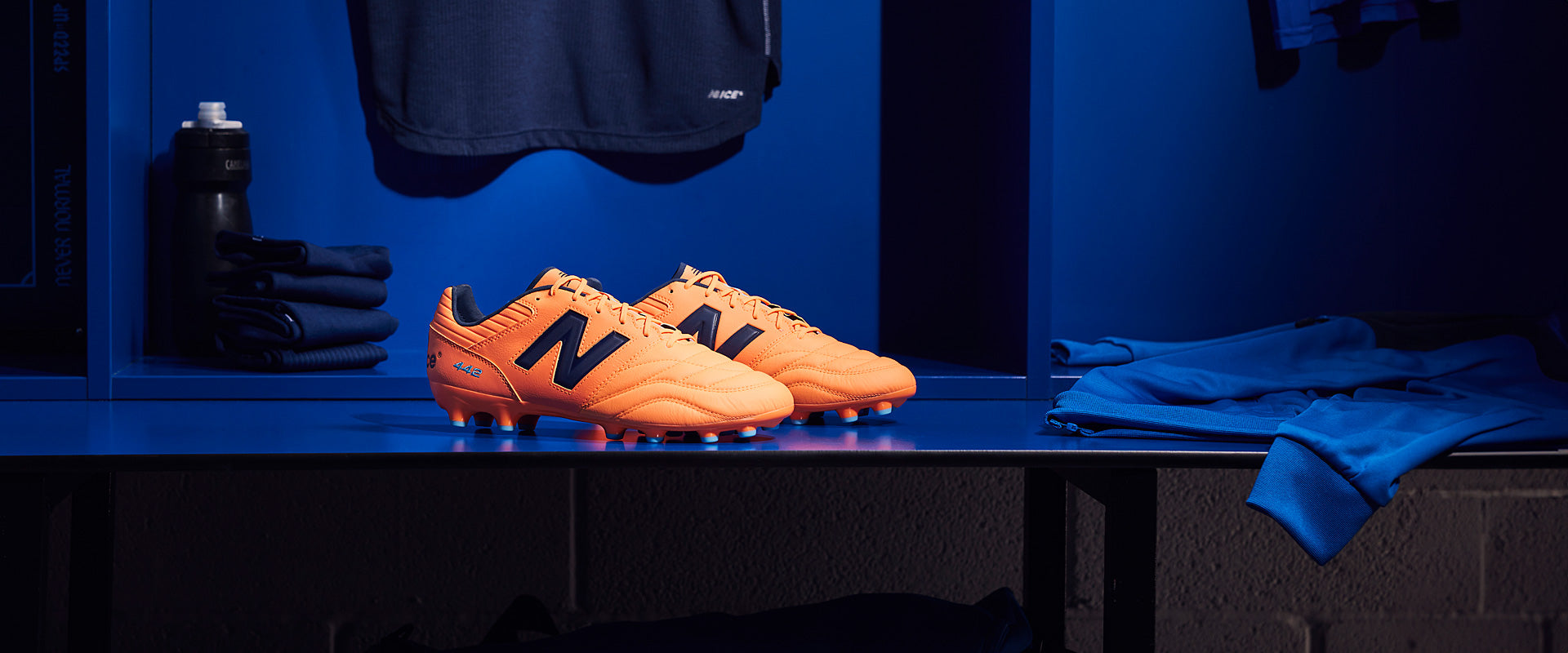 New Balance 442 V2 Pro Firm Ground - Hot Mango - Adult Boots