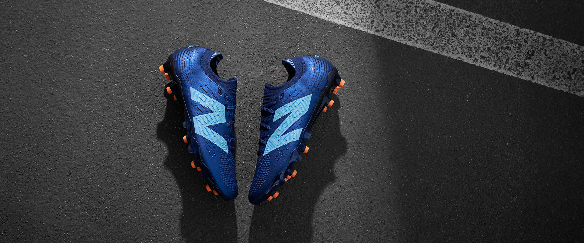 New Balance Tekela V4+ Pro Low-Cut Firm Ground - NB Navy - Adult Boots