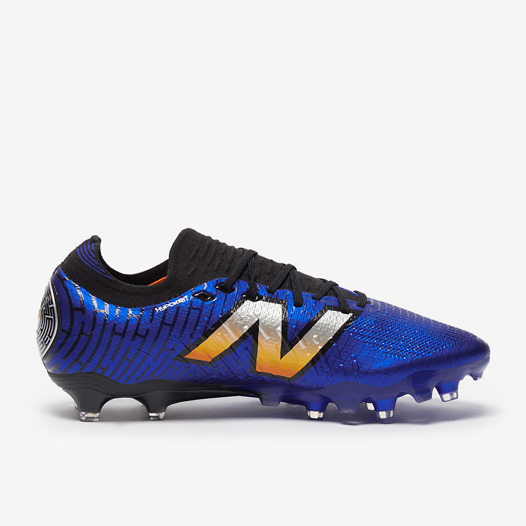 New Balance Tekela V4+ Low Laced Pro Firm Ground - Blue/Orange