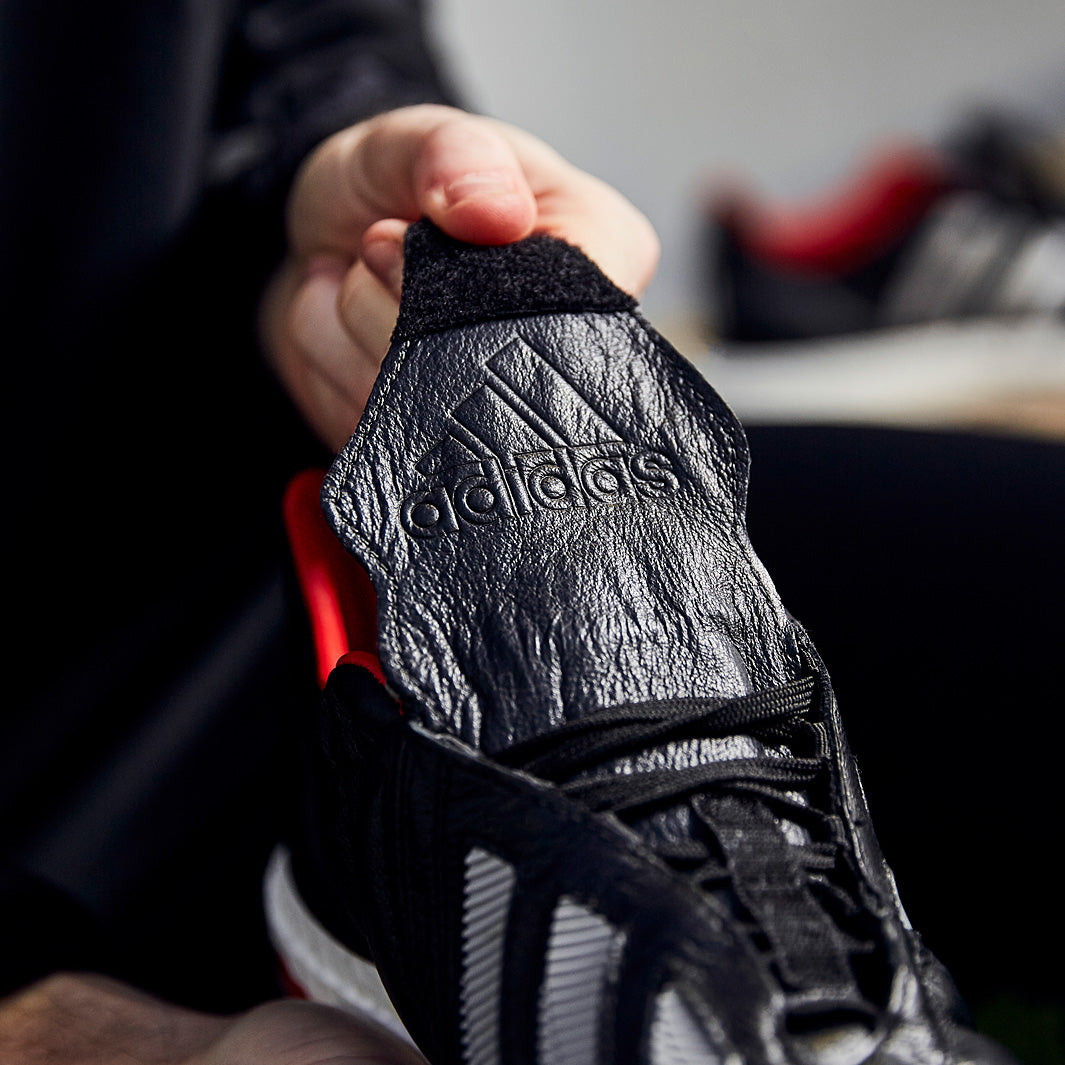 シューズ ADIDAS PREDATOR MANIA TR adidas Predator Mania TR - Core Black/Metallic Silver/Predator Red